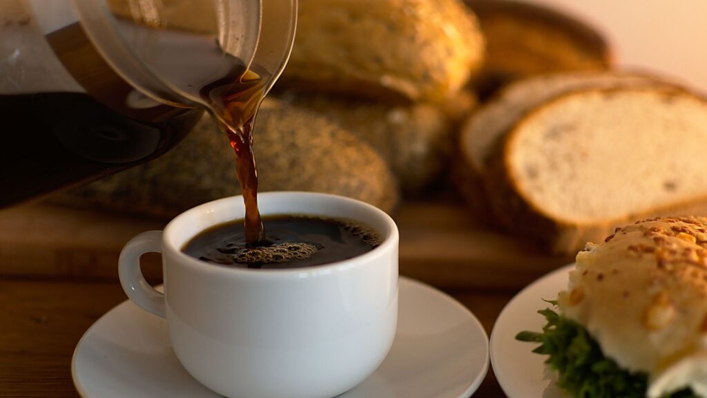 Shot of coffee and bread