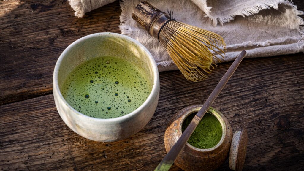 Matcha and matcha powder on a wooden table
